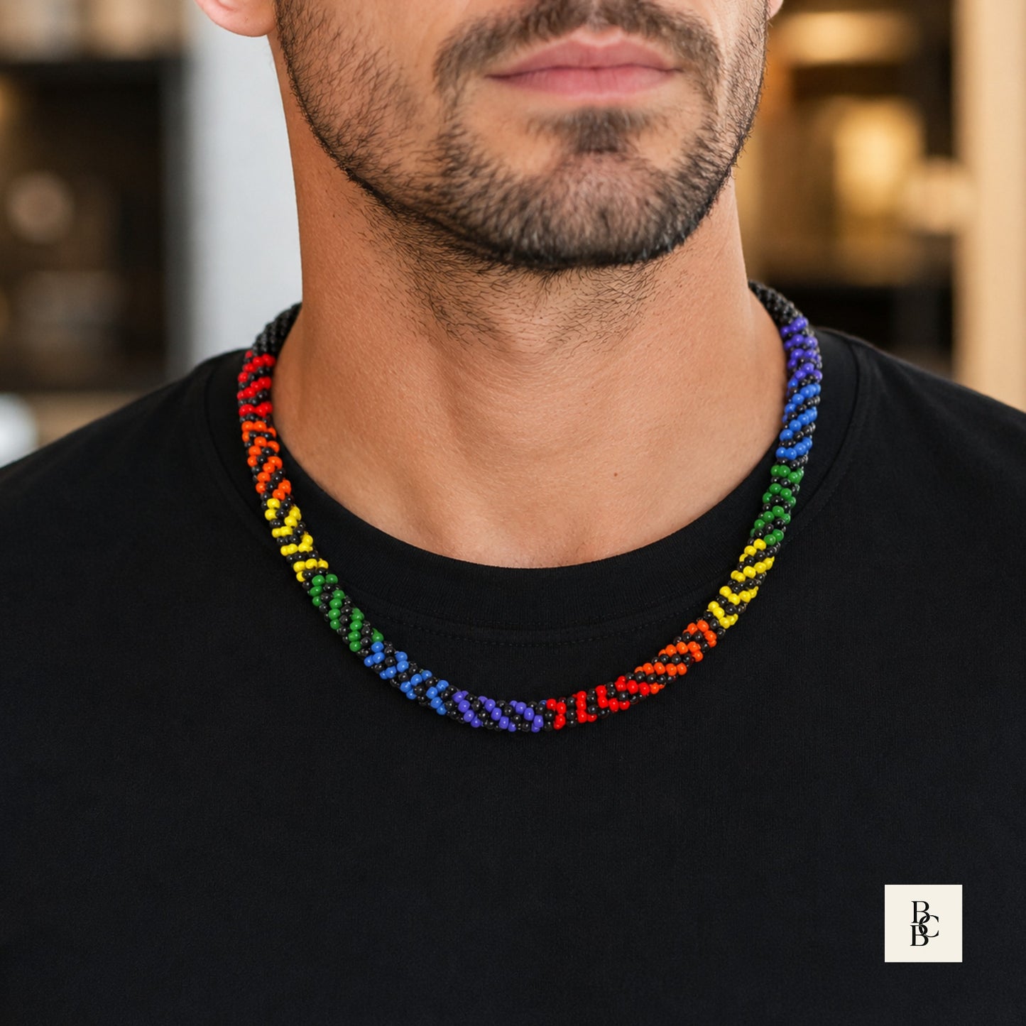 Rainbow Illusion Pride Kumihimo necklace worn by male model, showing 24-inch men’s/unisex fit with rainbow glass beads